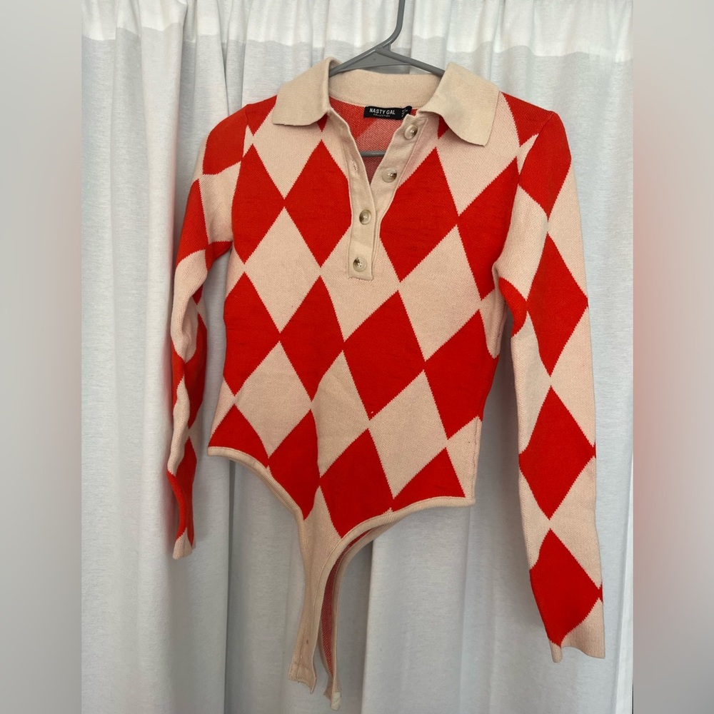 Nasty Gal size 2 bodysuit. Vibrant orange and beige pattern